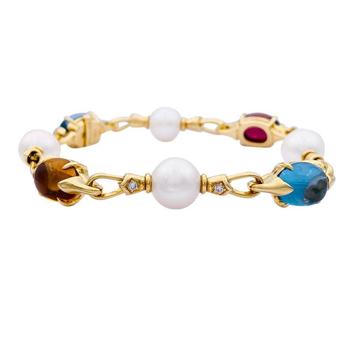 Bracelet Bracelet Bulgari en or jaune, perles, pierres de couleur. 58 Facettes 33083