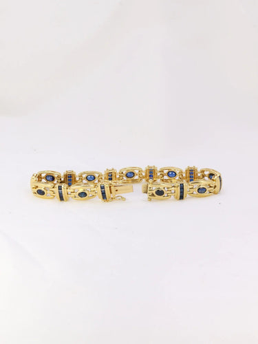 Bracelet Bracelet en or et saphirs ovales et calibrés 58 Facettes J224