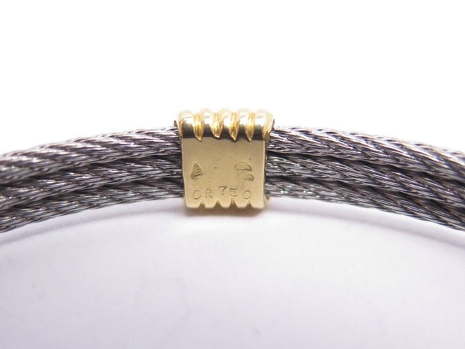 Bracelet vintage bracelet FRED force 10 en or jaune 18k et acier 58 Facettes 242577