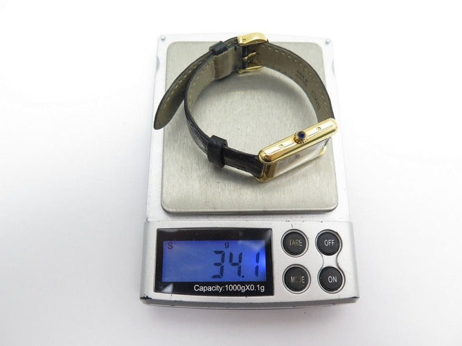 Montre montre tank louis CARTIER 2442 quartz 30 mm en or 18k crocodile 58 Facettes 220473