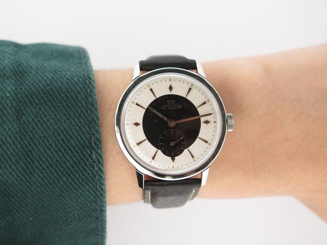 Montre vintage montre LEMANIA two tone 35 mm mecanique acier palladier 58 Facettes 250830