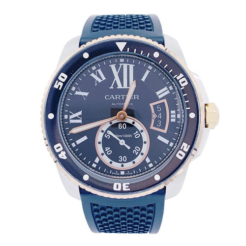 Montre Montre Cartier Calibre en or et acier sur bracelet caoutchouc. 58 Facettes 32552