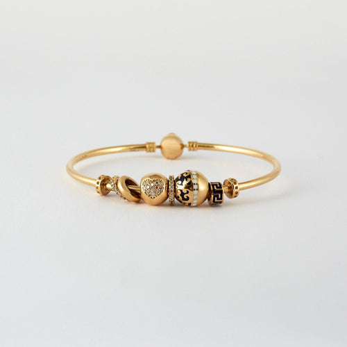 Bracelet Bracelet or jaune 18 k et ses charms 58 Facettes