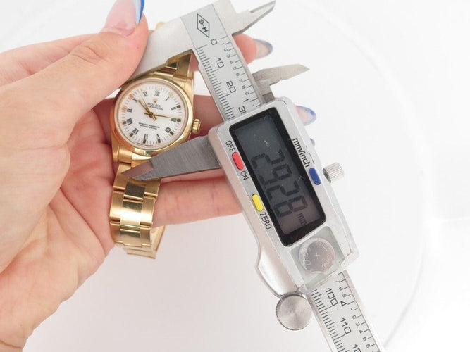 Montre vintage montre ROLEX oyster perpetual 67488 31 mm automatique or jaune 18k 58 Facettes 252911