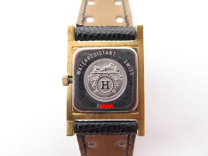 Montre montre HERMES medor 23 mm quartz en plaque or et cuir noir en 58 Facettes 243860