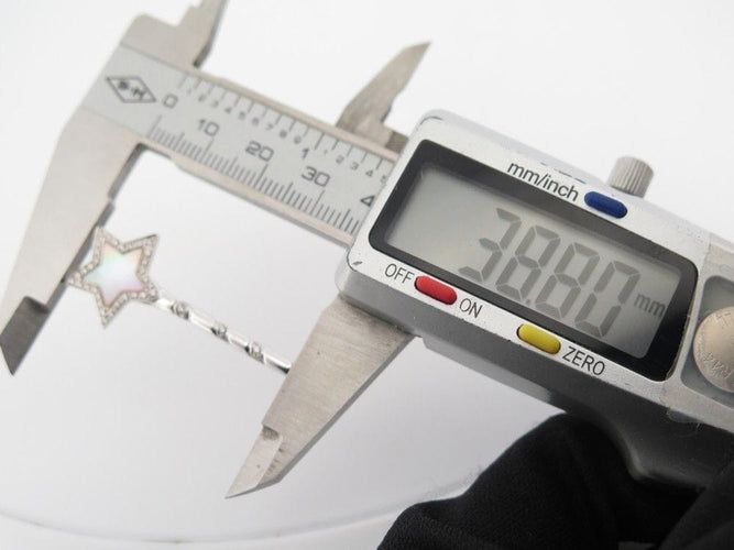 Pendentif pendentif VICTORIA CASAL etoile nacre or blanc 18k 41 diamants 0.24ct 58 Facettes 253612