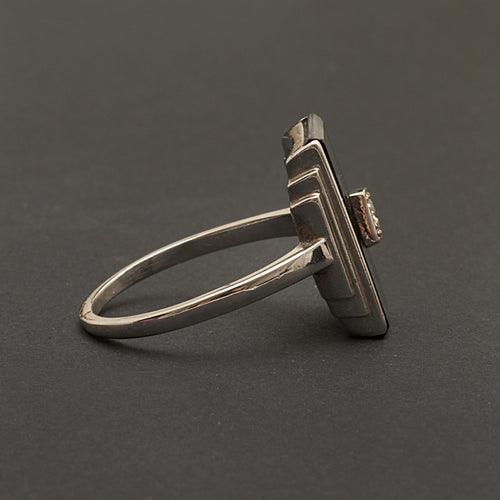 Bague Bague Art Déco en or gris, onyx et diamant "Blink" 58 Facettes 1966