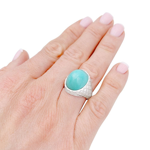 Bague 50 Bague or blanc, cabochon de turquoise. 58 Facettes 32544