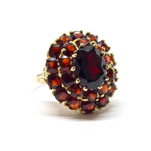 Bague Bague ancienne fleur grenats or jaune 58 Facettes