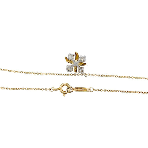 Collier Collier Tiffany&Co. Schlumberger, "Lynn", or jaune, platine et diamants. 58 Facettes 31266