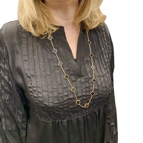 Collier Sautoir Van Cleef & Arpels, "Vintage Alhambra", or jaune, onyx. 58 Facettes 32128