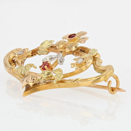 Broche Broche ancienne en ors aux motifs floraux 58 Facettes 19-196