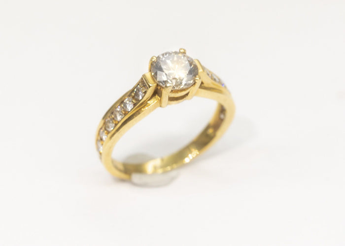 Bague 54 Bague Or 18k sertie d'un diamant Central de  1,10 carat 58 Facettes