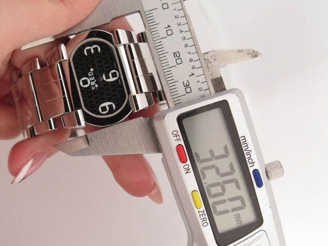 Montre montre FRED move one 32 mm acier palladie quartz 58 Facettes 258129