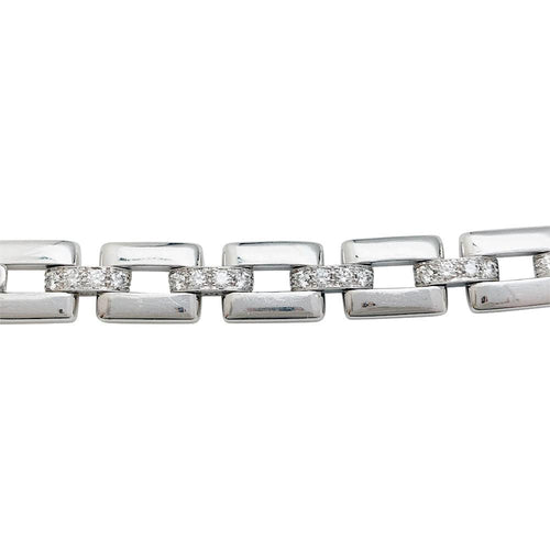 Bracelet Bracelet Cartier "Panthère de Cartier" en or blanc, diamants, émeraude et onyx. 58 Facettes 31544