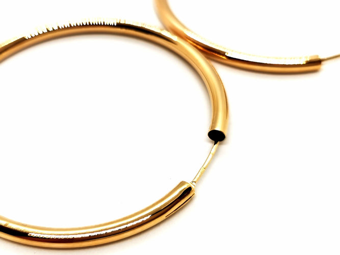 Boucles d'oreilles Boucles d'oreilles Créoles Or jaune 58 Facettes 1660379CN