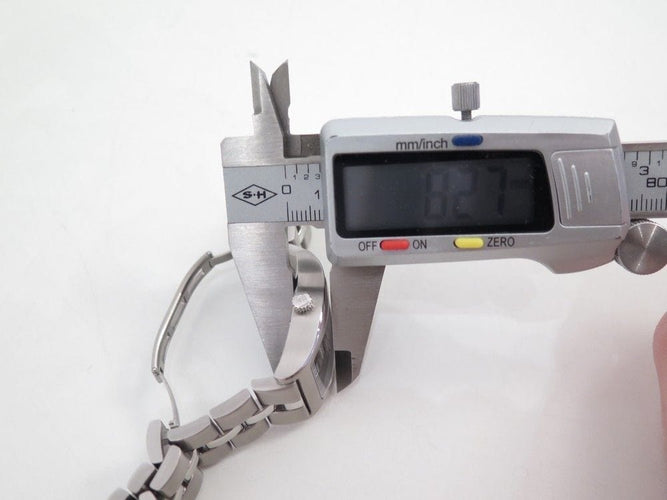 Montre montre TUDOR archeo 30210 tonneau acier femme 30 mm quartz 58 Facettes 193239