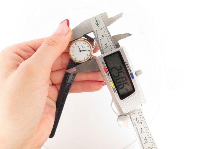 Montre vintage montre HERMES arceau 25mm plaque or bracelet cuir crocodile quartz 58 Facettes 256219