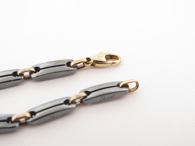 Bracelet vintage bracelet CARTIER a maillons 19 or jaune 18k hematite 58 Facettes 258414