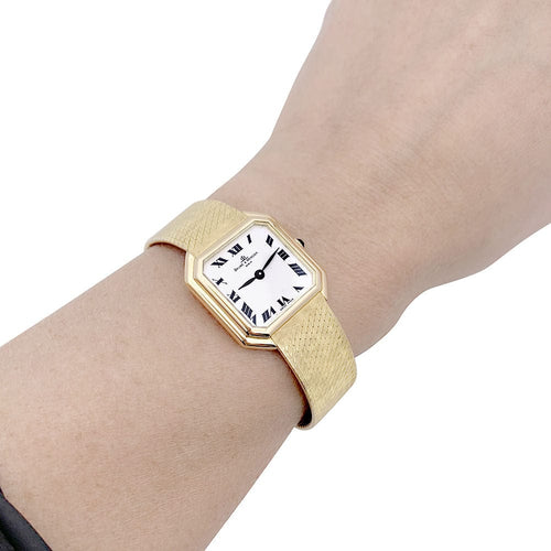 Montre Montre vintage Baume & Mercier, or jaune. 58 Facettes 33399