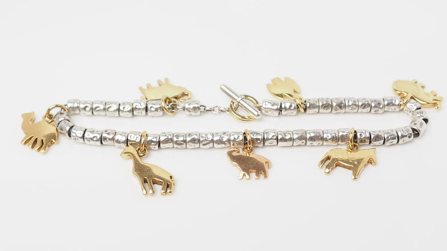 Bracelet 19cm Bracelet breloques Dodo en or jaune et argent 58 Facettes 25557