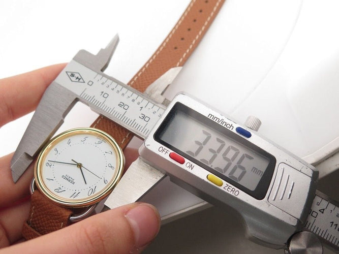 Montre montre HERMES arceau quartz 33 mm or & acier 58 Facettes 254345