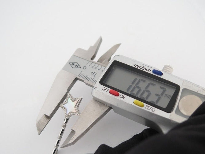 Pendentif pendentif VICTORIA CASAL etoile nacre or blanc 18k 41 diamants 0.24ct 58 Facettes 253612