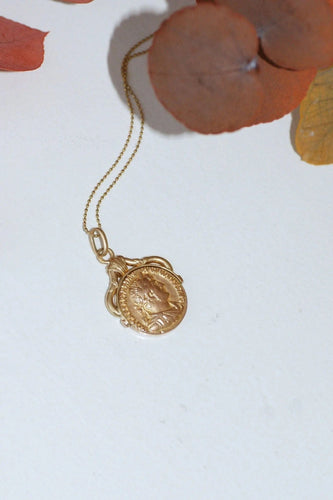 Pendentif Médaille pivotante pièce romaine or 58 Facettes