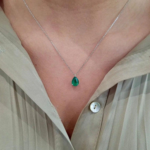 Collier Collier solitaire en or blanc, émeraude 58 Facettes