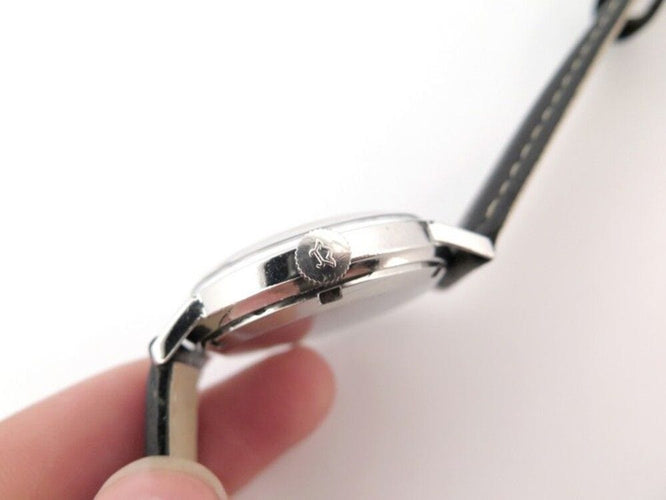 Montre vintage montre LEMANIA two tone 35 mm mecanique acier palladier 58 Facettes 250830