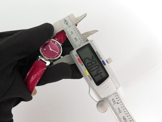 Montre montre LOUIS VUITTON tambour q12mc en acier 28 mm quartz lady 58 Facettes 254178