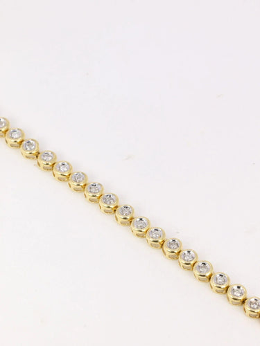 Bracelet Bracelet tennis vintage or jaune et diamants en serti clos 58 Facettes J92