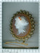 Broche Broche camée or, perles émail noir 58 Facettes 19176-0039
