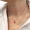 Collier Collier Pomellato, "Capri", or rose, corail, tsavorites. 58 Facettes 30912