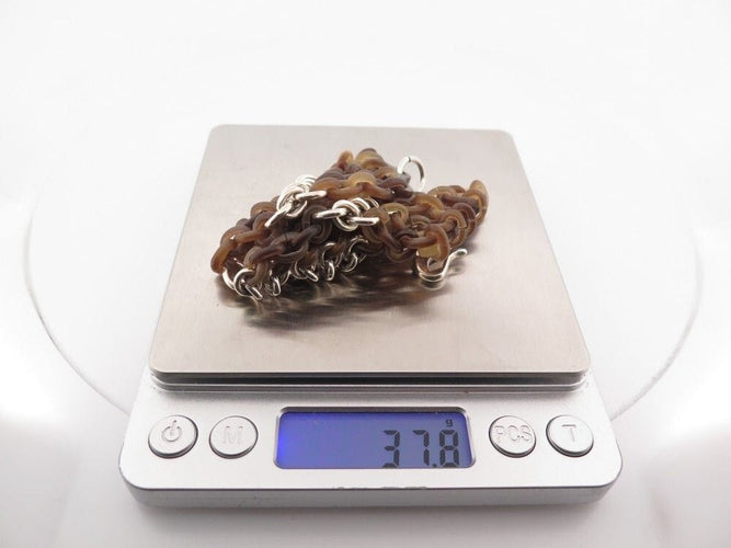 Bracelet bracelet HERMES manchette maillons 18 cm argent 925 et corne de buffle 58 Facettes 257682