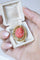 Broche ancienne en or jaune et camée ange en corail 58 Facettes