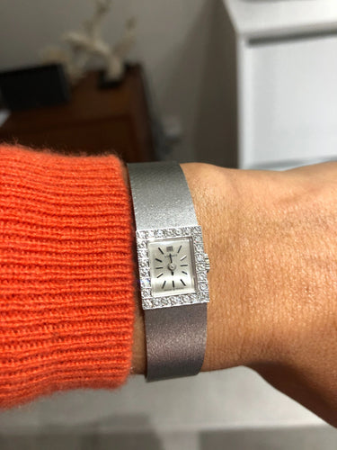 Montre Montre Tissot or gris et diamant 58 Facettes 0