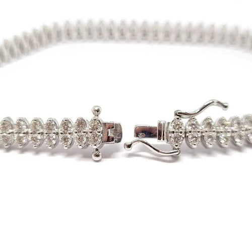 Bracelet Bracelet rivière de diamants or blanc 58 Facettes