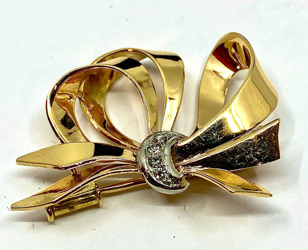 Broche Broche noeud diamants 58 Facettes