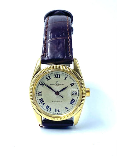 Montre BAUME ET MERCIER - Boitier Baumatic en or 58 Facettes