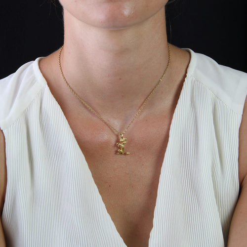 Pendentif Breloque caniche assis or jaune 58 Facettes 23-215