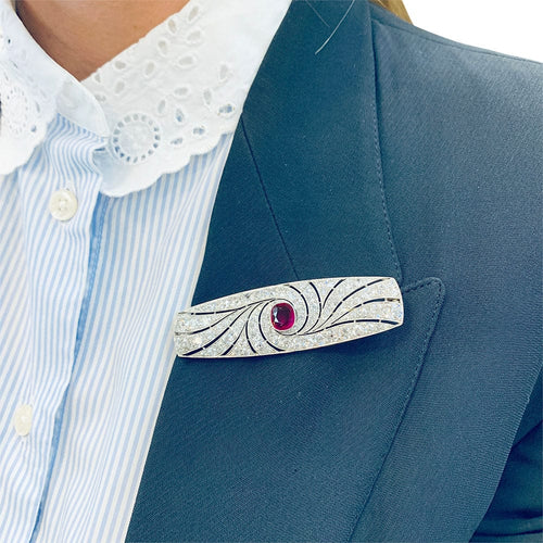 Broche Broche Art Déco en platine, rubis et diamants. 58 Facettes 31864