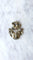 Broche Broche ancienne operculum, grenat, et porcelaine 58 Facettes