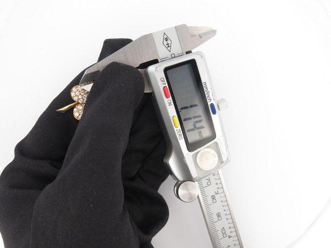 Broche vintage broche VAN CLEEF & ARPELS cosmos or jaune 18k diamants 3.65ct 58 Facettes 250924