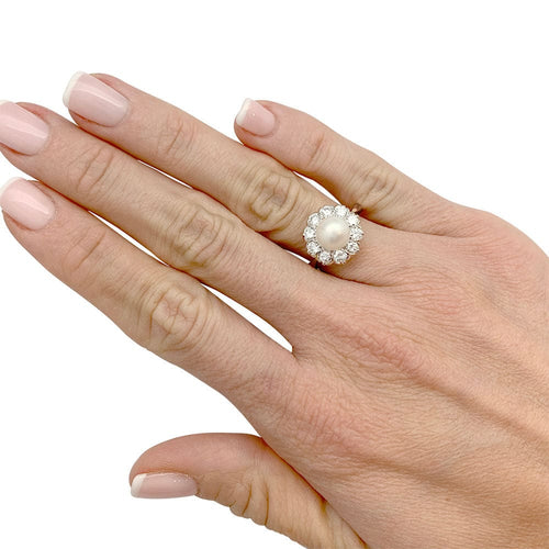 Bague 53 Bague marguerite perle et diamants. 58 Facettes 32110