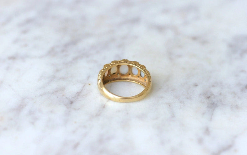 Bague Bague jarretière opales et diamants 58 Facettes