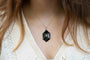 Collier Collier pendentif 1920 onyx et diamants 58 Facettes 24854