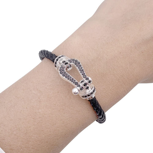 Bracelet Bracelet Fred, "Force 10", or blanc, acier et diamants noirs. 58 Facettes 33414