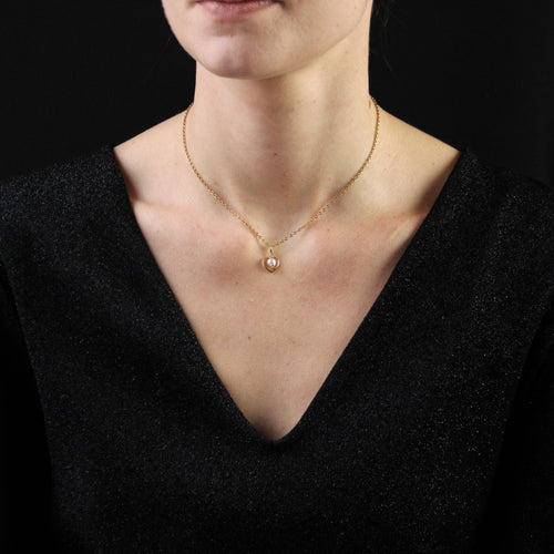 Pendentif Pendentif or jaune coeur et perle baroque 58 Facettes CVP55