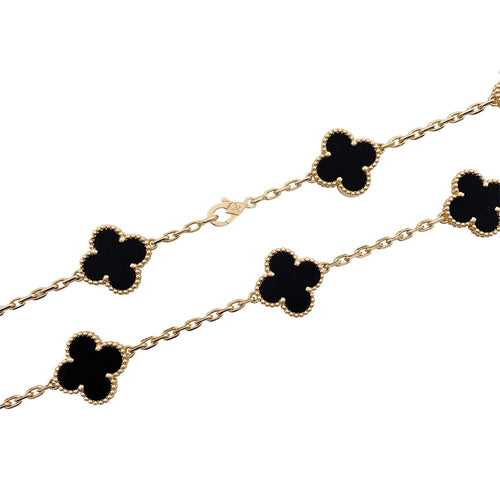 Collier Sautoir Van Cleef & Arpels, "Vintage Alhambra", or jaune, onyx. 58 Facettes 32128
